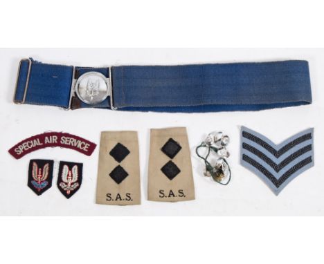An SAS stable belt:, together with a collection of SAS buttons and shoulder badges and a colour tinted portrait photograph of