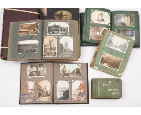 A collection of seven early 20th century postcard albums and content:, mostly GB and foreign topographical, also including fa