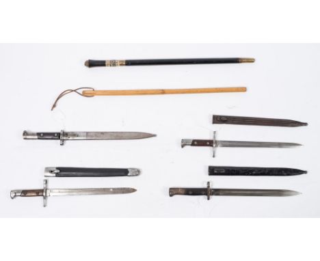 A group of five  various bayonets including a Czechoslovakian example:, together with, a sword swagger stick and a  cane swag