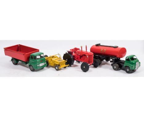 A Tri-ang  friction drive 'Shell' petrol tanker:, together with a yellow clockwork 'AA' jeep, a tipper lorry and a diecast Ma