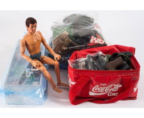 A Palitoy Action Man flock hair 'eagle eyes' Soldier together with a collection of various accessories:, including helmets, b