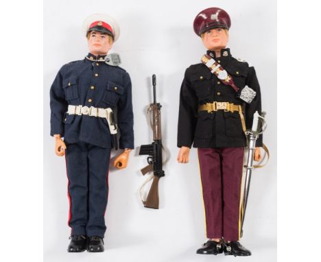 An Action Man flock hair Royal Hussar and Royal Marine:, both in uniform with accessories (2)