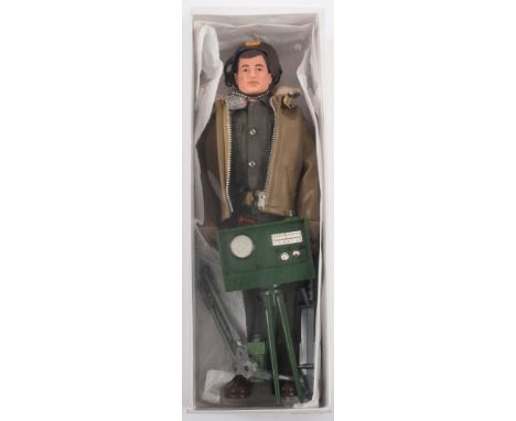 A Palitoy Action Man painted head Armoured Car Commander:, in uniform with  radio and machine gun accessories. 