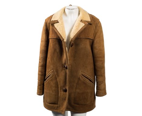 Two three quarter length leather jackets,: a lady's jacket, a cream suit and a sheepskin.