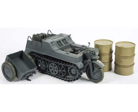 A Did Corp 1/6th scale WWII German Kettenrad and trailer:, together with two  oil drums. 