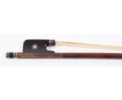 A silver mounted violin bow by Charles Bazin: with round stick and mother-of-pearl inlaid frog, stamped twice Charles Bazin -