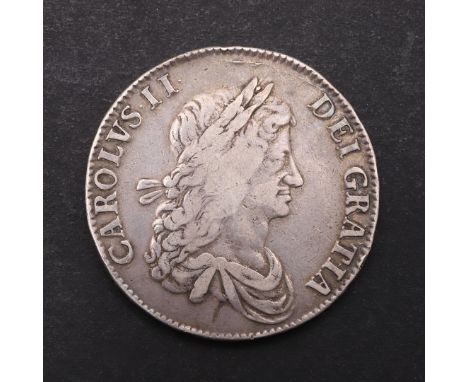 A CHARLES II CROWN, 1663. A Charles II Crown, first draped bust, r. reverse with cruciform shields with interlaced 'C's  to t