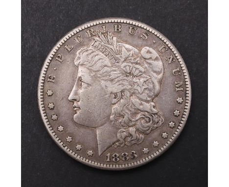 AN AMERICAN 'MORGAN' DOLLAR, 1883. A Morgan type dollar, 1883. Bust of Liberty with wreath and date 1883, reverse eagle with 
