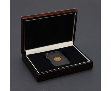 A QUEEN VICTORIA HALF SOVEREIGN, 1865. A Queen Victoria Half Sovereign, bare head l. Reverse with crowned shield of arms, dat