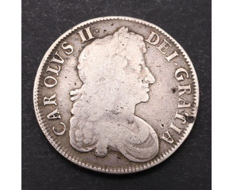 A CHARLES II CROWN, 1676. A Charles II Crown, third draped bust, r. reverse with cruciform shields with interlaced 'C's  to t