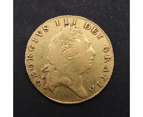 A GEORGE III HALF-GUINEA 1803. A Half-Guinea, sixth laureate bust r. Reverse shield in Garter above date 1803. c. 4.16 g. *CR