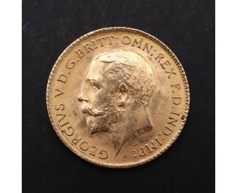 A GEORGE V HALF SOVEREIGN, 1914. A George V Half Sovereign, bare head l. reverse St. George and the Dragon, dated 1914. *CR  