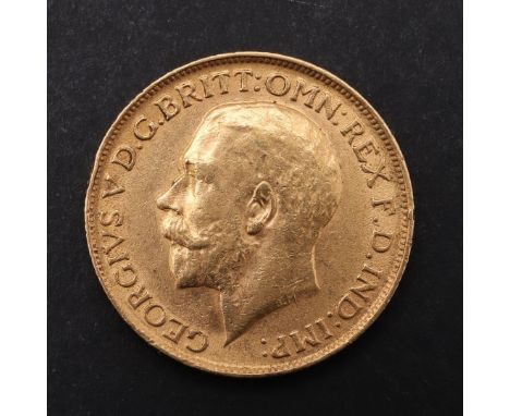 A GEORGE V SOVEREIGN. 1911. A George V Sovereign, bare head bust r. reverse St George and the Dragon. 1911. *CR  Some light m