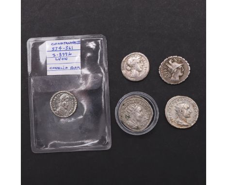 A SMALL COLLECTION OF ROMAN SILVER COINS. Five silver coins: A Republic period Denarius serratus, C. Poblicius, helmeted and 