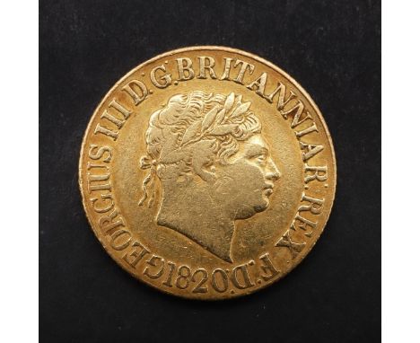 A GEORGE III SOVEREIGN, 1820. A George III Sovereign, laureate head r. legend with space between REX and F:D: Reverse with St