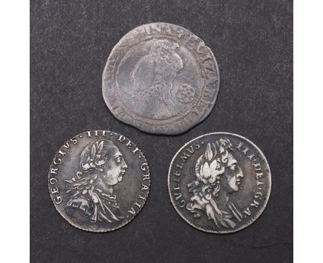 AN ELIZABETH I HAMMERED SILVER SIXPENCE AND TWO OTHERS. An Elizabeth I sixpence, fifth issue, crowned bust l. with rose behin