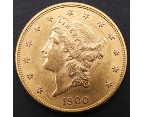 AN AMERICAN GOLD TWENTY DOLLAR COIN, 1900. A gold 20 dollar 'double eagle' coin. Liberty head l. beneath 13 stars and above d