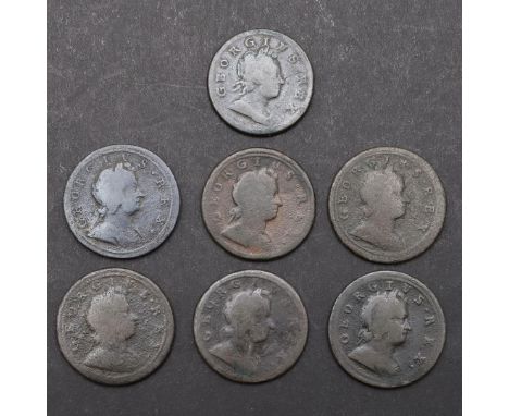 A DATE RUN OF GEORGE I COPPER HALFPENNIES, 1718 - 1724. George I halfpennies, mostly second issue, second obverse, laureate b