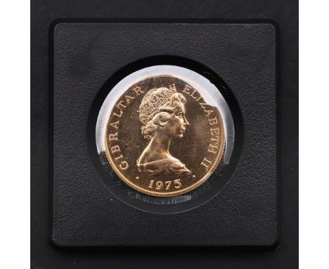 A GIBRALTAR GOLD FIFTY POUND COIN, 1975. An Elizabeth II Gibraltar  £50.00 coin, Crowned bust r. Crowned seated figure enthro
