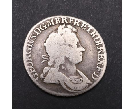 A GEORGE I SHILLING, 1723. A George I Shilling, laureate and draped bust r., reverse with SSC for South Seas Company in angle