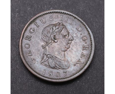A GEORGE III PENNY, 1807. A George III Penny, fourth issue, Soho Mint, laureate bust r. Reverse seated figure of Britannia, 1