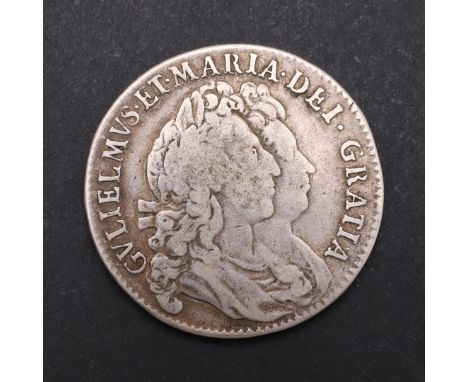 A WILLIAM AND MARY HALFCROWN, 1693. Second busts r. Reverse with crowned cruciform shields and WM monogram in angles, dated 1