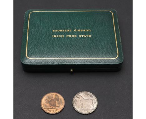 AN IRISH PROOF HALFCROWN 1928 AND SIMILAR PENNY. A proof halfcrown, Harp with date 1928, Reverse Standing horse with value to