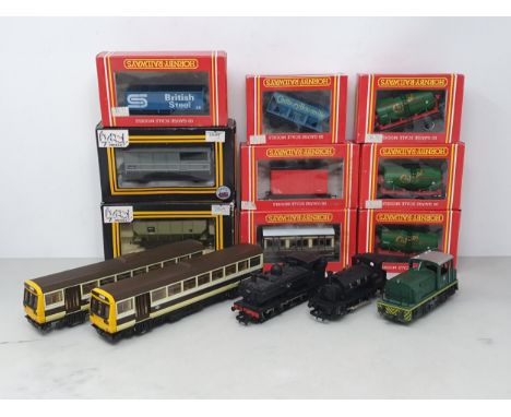 An unboxed Hornby 00 gauge D.M.U, an unboxed Bachmann 0-6-0T Pannier Tank, an LMS 0-4-0T saddle Tank, a Lima 0-4-0 diesel Shu