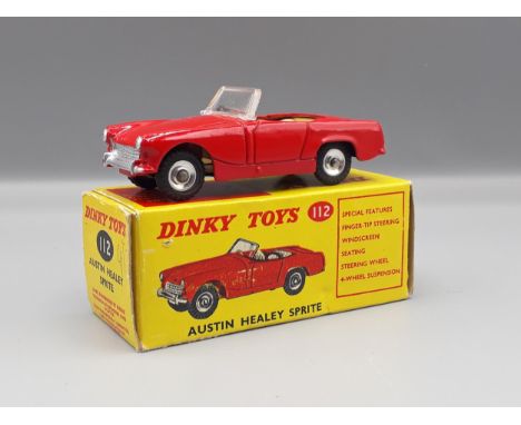 A boxed Dinky Toys No.112 Austin Healey Sprite, Nr M-M, box with packing ring VG-E 
