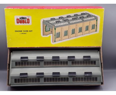 Hornby Dublo 5005 Engine Shed Kit in near mint condition, has had the windows and drain pipes extremely neatly glued into pla