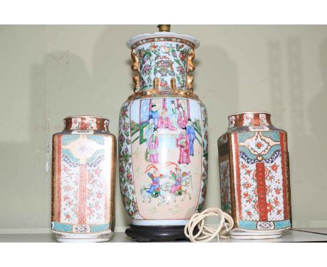 Oriental Chinese table lamp and a pair of vases.