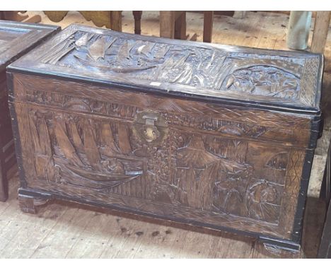 Eastern carved camphorwood trunk, 61cm by 103cm by 51cm.