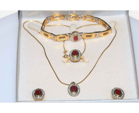 Ruby and diamond 18 carat gold suite of jewellery containing necklace with pendant, bracelet, ring and pair of earrings, each