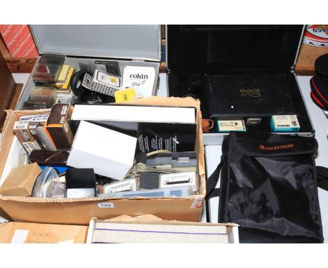 Collection of cameras and binoculars including Celestron Skymaster, Minox C, three miniature cameras, assorted photographic e