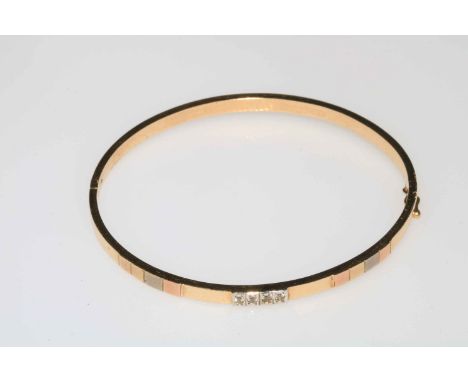 14 carat multi colour gold bangle.