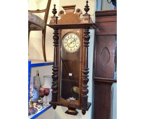 Victorian walnut Vienna style wall clock with enamelled dial.