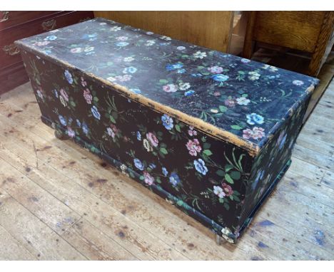 Floral painted pine trunk, 57cm by 124cm by 52cm.