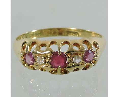 An 18 carat gold, ruby and diamond ring, boxed 