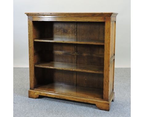 A light oak dwarf open bookcase, 100cm
