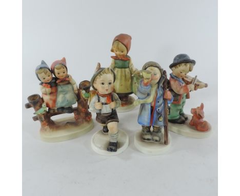 A collection of Hummel figures, tallest 15cm