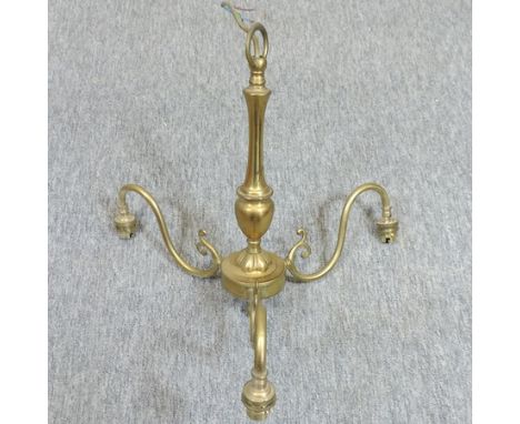 A brass three branch chandelier, 46cm diameter