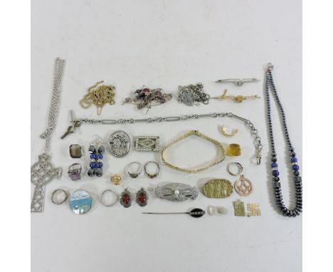 A collection of jewellery, to include silver brooches, a mourning stick pin and various chains