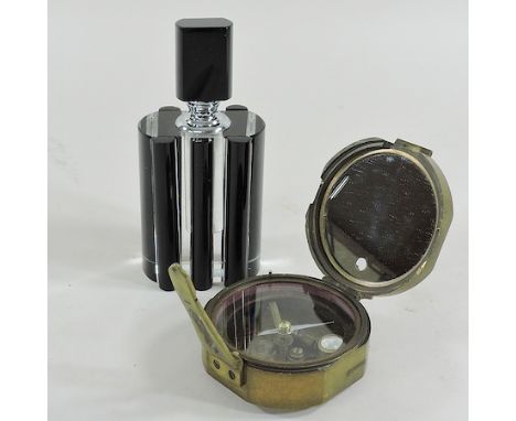 An Art Deco style scent bottle, 15cm tall, together with a brass compass