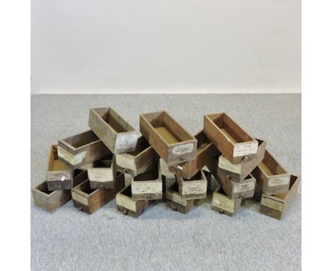 A collection of vintage oak drawers, each 14cm wide 