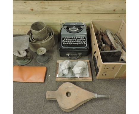 Two boxes of items to include grain measures, scales and bellows, together with a Harrods typewriter 