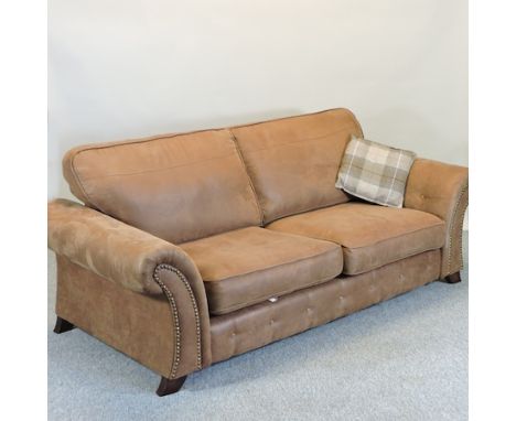 A brown suede upholstered two seater sofa, 202cm