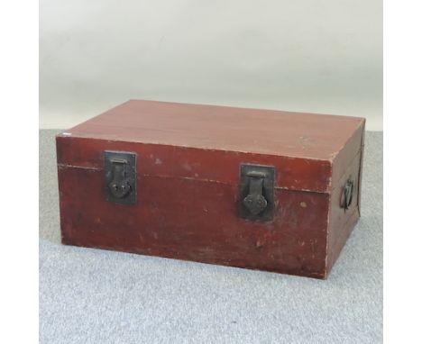 A Chinese lacquered leather trunk, 82cm