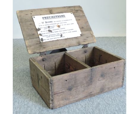 A vintage World War II wooden , A.W. bomb box, stamped to the lid, 50cm