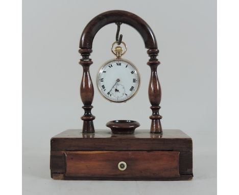 A 9 carat gold cased pocket watch, with a white enamel dial, on a Victorian mahogany watch stand, 17cm tall