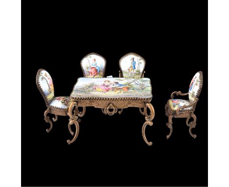 Antique Viennese Enamel Miniature Table and Chairs Set. Marked "Austria" beneath the table. Includes four chairs and one tabl